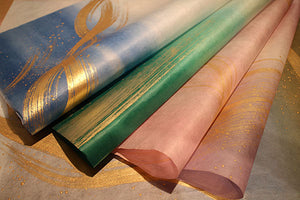 Colored Paper with Gold Brush Strokes